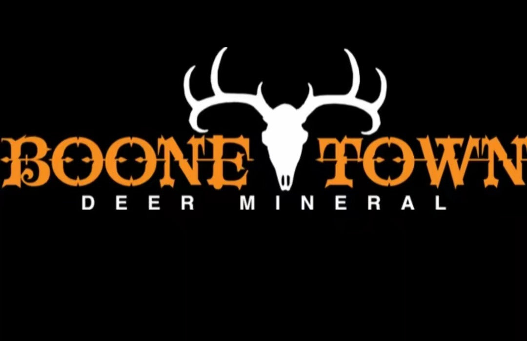 Boone Town Deer Mineral logo with deer skull and antlers on a black background
