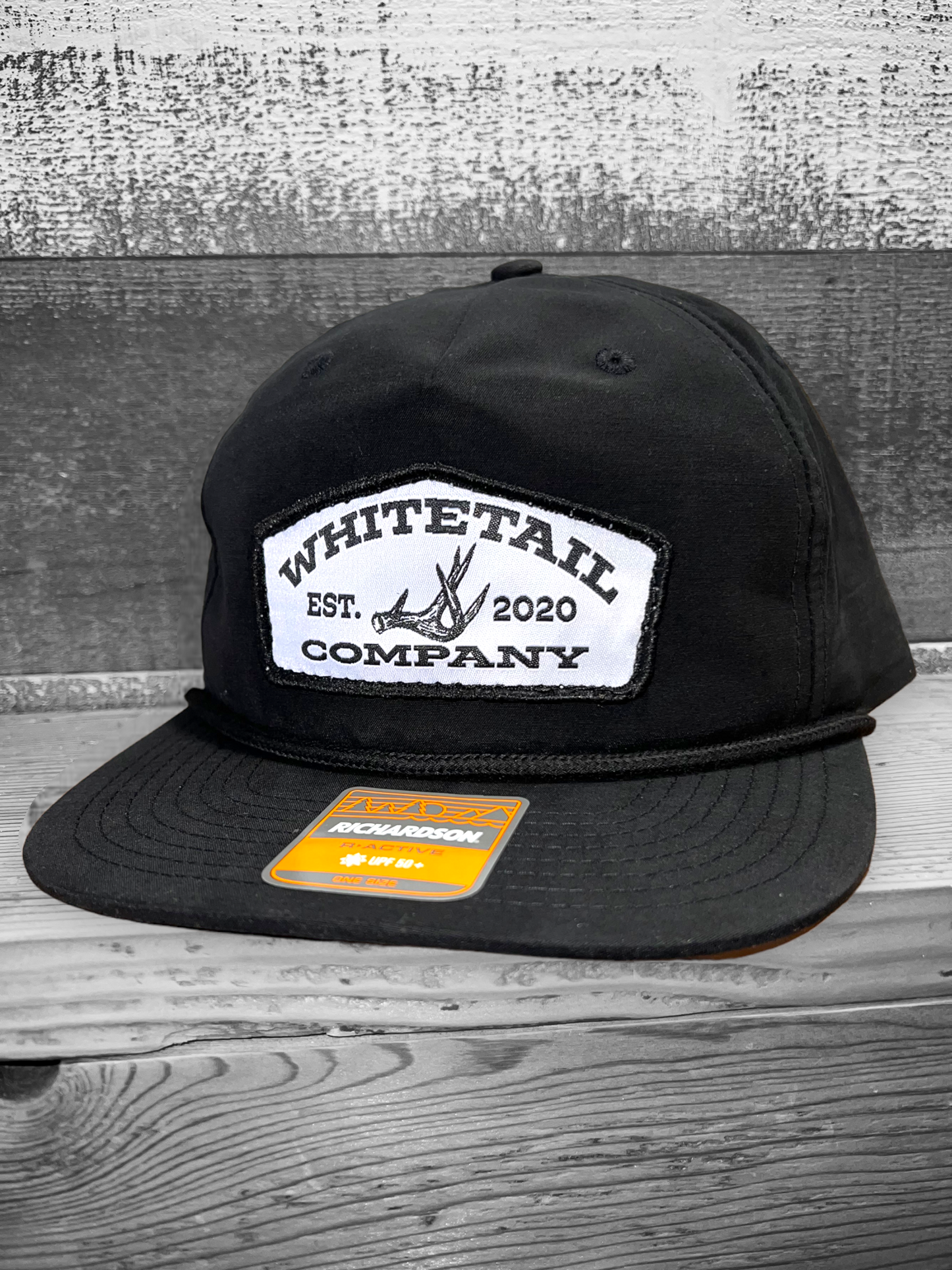 black trucker hat